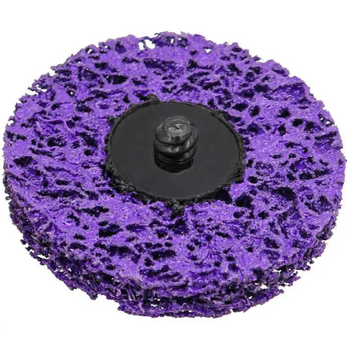 Purple abrasive cleaning pad with black plastic attachment for power drills, used for heavy-duty scrubbing and surface preparation in industrial cleaning applications.