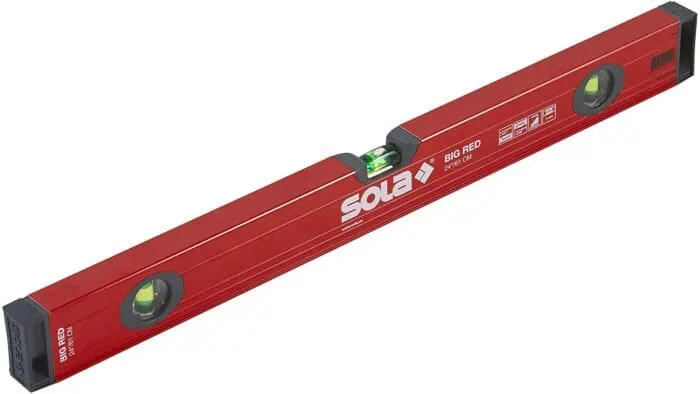 Red SOLA Big Red spirit level with dual bubble vials and precision measurement compartments for accurate leveling. Ideal for construction and woodworking projects.