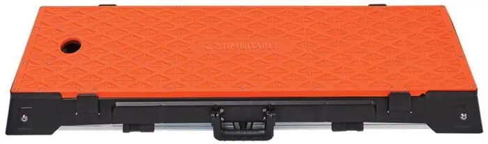 Flexible and durable orange plastic foot pedal for industrial control and foot switch applications.