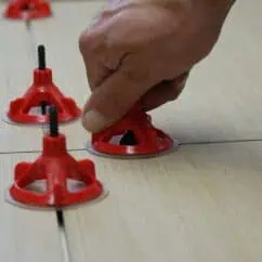 Temporary floor markers for sports or construction safety in red.
