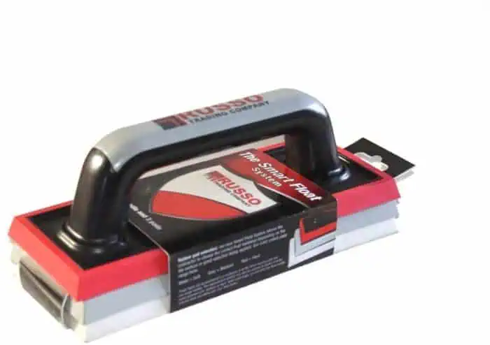 Heavy-duty push floor scraper with ergonomic handle for efficient removal of stubborn flooring materials, ideal for professional and DIY flooring projects.