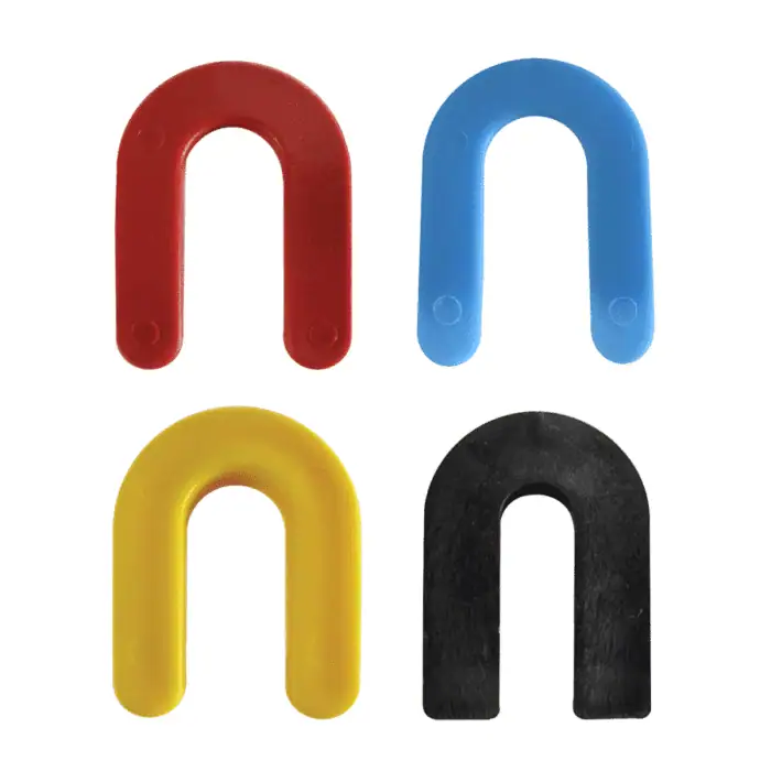 Colorful U-shaped magnets in red, blue, yellow, and black, used as educational tools or for magnetic applications. Brightly colored magnetic pieces for demonstrations or craft projects.