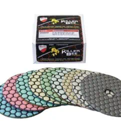 Colorful diamond polishing pads in various shades, along with a box of dry polishing pads, designed for use in dry polishing of porcelain, granite, marble, travertine, glass, and more.