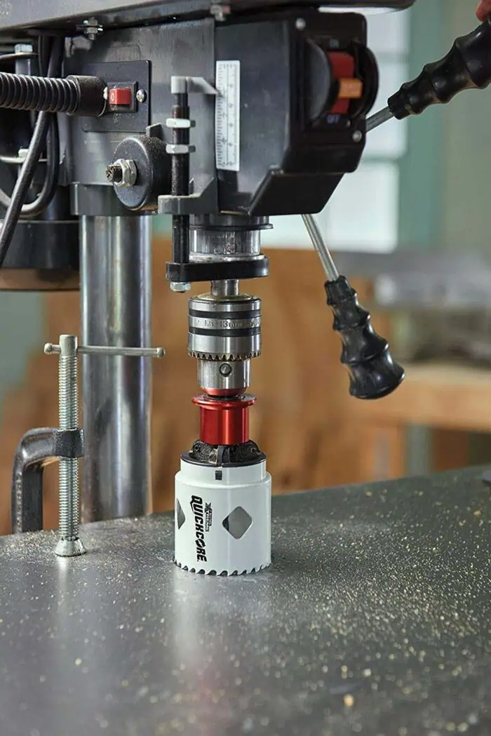 Drill press and precision manufacturing equipment for industrial drilling and machining processes, close-up view.