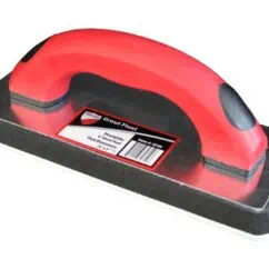 Red handheld grout float with black base for tile grout application, ergonomic design for professional masonry and tiling work.