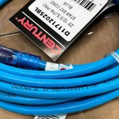 Blue automotive air hose with quick-connect fittings and safety tag, labeled "Double D Automotive.".