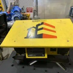 NIS Tools portable power distribution box with yellow protective cover and logo, used for industrial electrical applications and safe power management in construction or maintenance environments.
