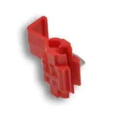 Red plastic dental tool for oral hygiene and dental cleaning.