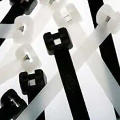 High-quality white and black plastic testing and calibration tools from NIS Tools, designed for precision measurement solutions in industrial and laboratory environments.