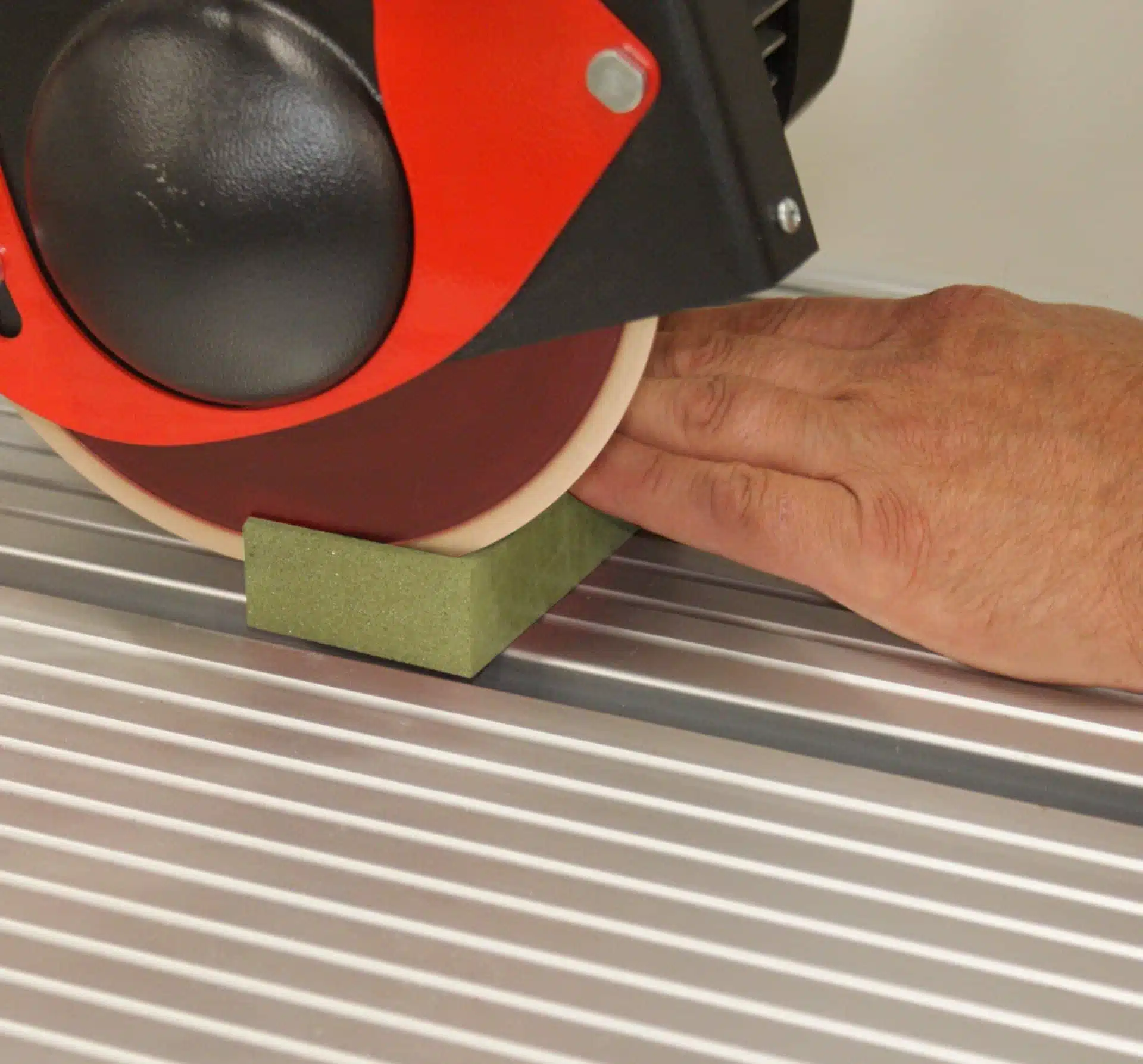 Precision cutting with a circular saw on a composite material, showcasing professional tools for industrial manufacturing and material processing.